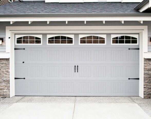 Modern steel craft garage doors enhance curb appeal in Edmonton residential area